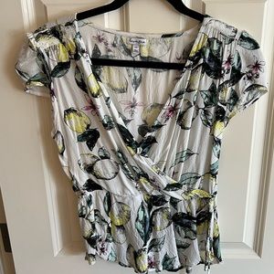 Cute lemon top with wrap styling.